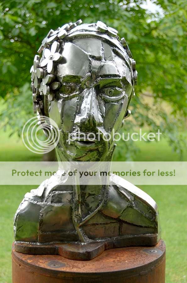 Sculpture of a head at Coughton Court Photo Maestro